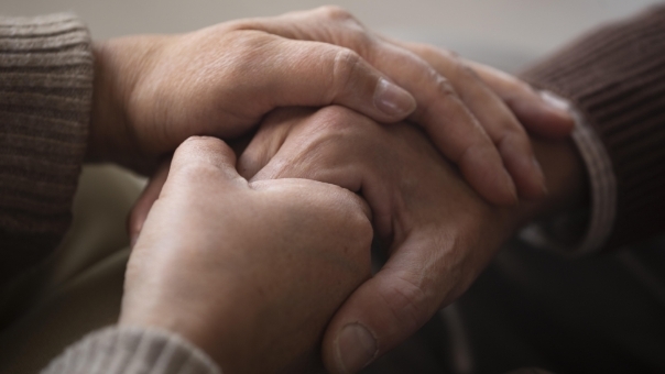 two people holding hands